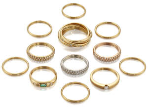 
	
		Twelve various diamond and plain band rings, including: a diamond-set triple hoop ring,...