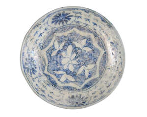 
	
		A small Timurid blue and white pottery bowl, Iran, 15th century, decorated to interior...