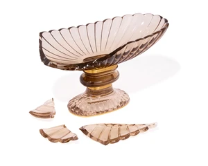 A smoky quartz tazza,&nbsp;damaged, the bowl with breaks, with ribbon and reed collars, height...