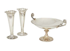 A small silver tazza, Sheffield, c.1929, James Dixon & Sons., the gadrooned rim to two scrolling handles with lion head detail, the tazza raised on a circular 