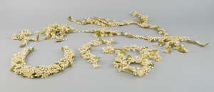 
	
		A bridal head piece, and various matching sections of floral wax sprays, in original...