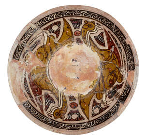
	
		A pottery bowl, Central Asia, 19th century, slip-painted with two addorsed birds in...