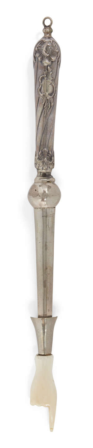 
	
		A German silver Torah pointer, the spirally fluted handle stamped 800, possibly taken...