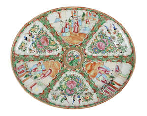 A large Chinese Canton porcelain oval plate, 19th century, painted in famille rose enamels with...