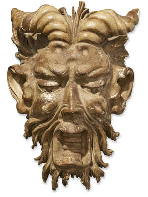 
	
		A large Italian carved wood mask of Pan, 18/19th century, with short curving horns, down...