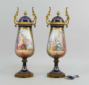 
	
		A pair of French Sevres style porcelain and gilt metal mounted vases and covers, late...