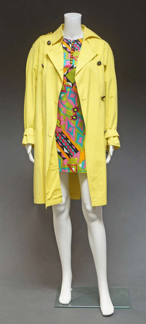 
	
		Gianni Versace, a acid lemon trench-coat style raincoat, together with a multi-colour...