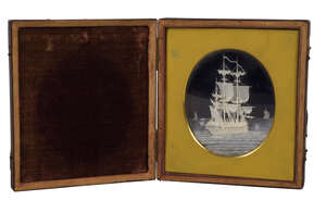 
	
		A micro-miniature ivory carving of a three-masted frigate under sail, by Stephany &...