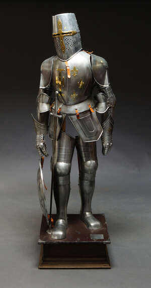 
	
		A Spanish reproduction suit of armour, together with sword and shield, on a plinth base,...