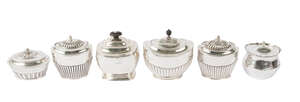 A silver sugar box, Birmingham c.1907, William Neale,  together with five further silver sugar boxes, approx 29.3oz, (6)