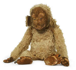 
	
		A Merry Thought plush monkey, with a printed expression on his face, with velour hands...