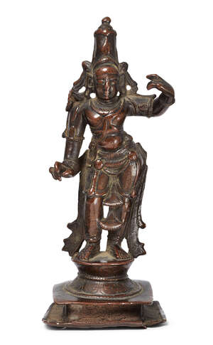 A bronze figure of Vishnu, India, 18th century, on a square, tiered base, rounded plinth, the figure finely moulded, 14.5cm. high