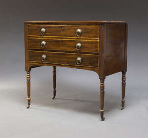 
	
		An early Victorian mahogany and line inlaid secretaire chest, the fall enclosing burgundy...