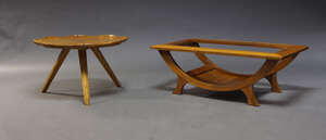 
	
		A continental occasional table, c.1960, the circular top with raised edges, on tapering,...
