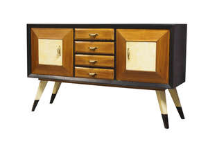 
	
		Italian, an ebonised, oak and parchment sideboard, 
		c.1940s,
		the rectangular top...