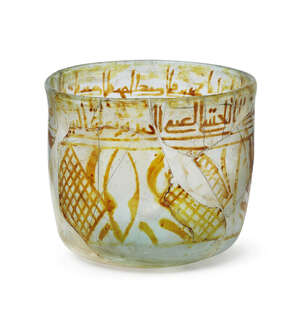 
	
		A Fatimid lustre decorated inscribed glass vessel, Egypt, 10th/ 11th century, of deep...