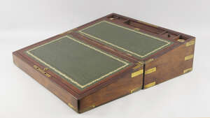 
	
		A Victorian brass bound writing slope, the interior with green tooled leather writing...