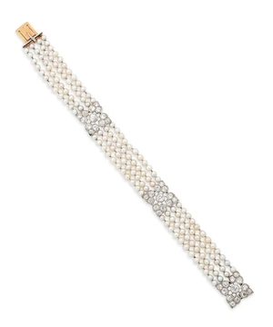 Marzo. A Belle Époque pearl and diamond bracelet, composed of three foliate motif openwork...