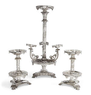 
	
		An impressive silver plated three part table centrepiece, comprising: a central ornament...