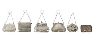 A George V silver purse, Birmingham c.1906, Stewart Dawson & Co ., of envelope form, with chain and finger-ring, 10.5cm wide, also a further silver purse, Birm