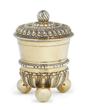 A Victorian silver and silver gilt cup and cover, London c.1898, F B Thomas & Co (Francis Boone Thomas) the cover with gadrooned circular finial, on lobed moun
