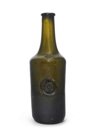 
	
		A pale green glass sealed wine bottle, 18th century, with long neck, with a circular seal...