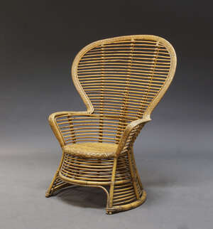 
	
		An Italian bamboo and rattan fan back chair, in the manner of Lio Carminati, c.1950s,...