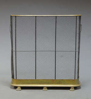 
	
		A late Victorian nursery fender with brass rail, with three brass lions paw feet, 83cm...