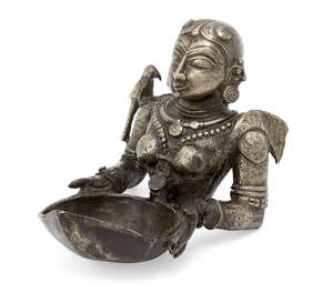 
	
		The upper section of a finely moulded brass figure of Meenakshi, the avatar of goddess...
