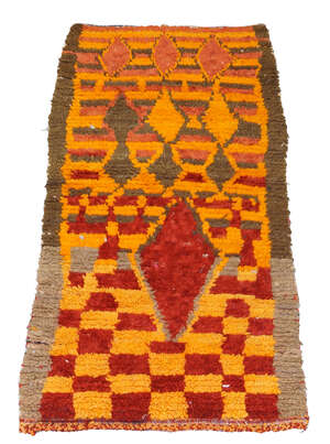 
	
		Moroccan, a handwoven long pile wool rug
		Second quarter 20th century
		Woven in red...