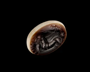 A Roman banded agate intaglio of a charioteer and bigacirca 1st - 2nd century AD
Agate, the...