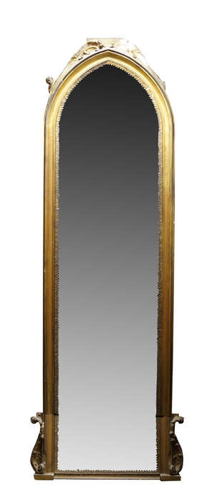 
	
		A large gilt wood and gesso pier mirror, 19th century and later, of arched form, the...
