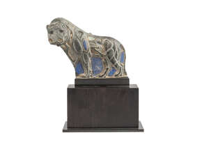 
	
		A Bactrian chlorite lion plaque, inlaid with lapis and turquoise, 2nd millennium BC., on...