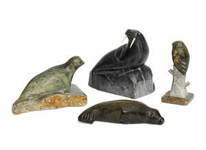 
	
		Appa Joseph, an Innuit grey brown soapstone carving of a seal, signed to base Appa Joseph...