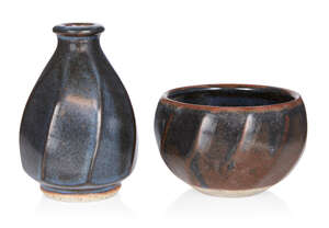 
	
		Nick Rees (b.1949) for Muchelney Pottery, 
		 
		Cut sided vase and bowl in blue-black...