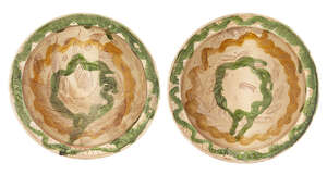 
	
		Two Byzantine pottery footed bowls, 9-10th century, the unglazed body decorated to the...