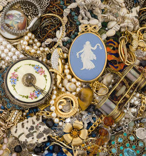 A large quantity of miscellaneous costume jewellery and other items, including: a gilt mounted Wedgewood pendant; a pair of early 20th century opera glasses wi