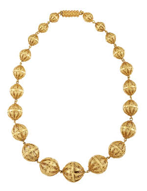 A 19th century gold Indian bead necklace,  composed of a single-row of graduated openwork filigree beads to a barrel-shaped clasp with bead decoration, 40cm lo