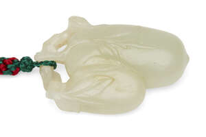 
	
		A Chinese pale green jade fruit pendant, late 19th century, carved as a leafy branch...