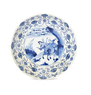 
	
		A Chinese porcelain saucer dish, Chenghua mark, Kangxi period, painted in underglaze blue...