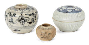 Two Chinese porcelain jarlets, Ming dynasty, painted in underglaze blue with floral sprays, 6cm and 3.5cm high, and a similar box and cover, 5.5cm high (3)
		