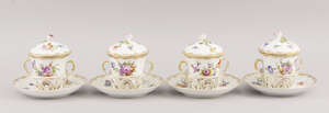 A set of four German porcelain trembleuse twin handled cups, with saucers and covers, late 19th/early 20th century,  the covers with rose form finials, overall