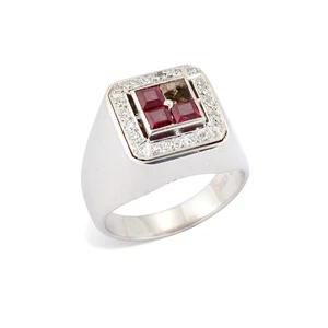 De Vroomen. An 18ct white gold ruby and diamond ring, the centre set with square step-cut...