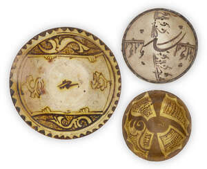 
	
		Three Nishapur slip-painted pottery bowls, Iran, 9th-10th century, the first of shallow...