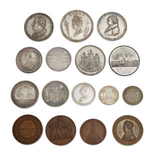 
	
		Client to collect.A group of sixteen medals, fifteen related to the Heineken family and...