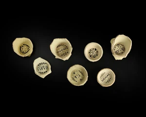 Seven fragmentary unglazed pottery water filters,&nbsp;Fatimid or Mamluk Egypt, 10th-14th...