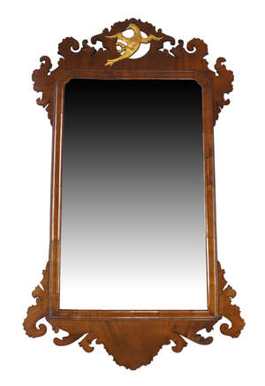 
	
		A George III mahogany fretwork mirror, late 18th century, the scrolling frame with...
