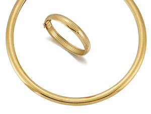 
	
		A necklace and bracelet, of flexible design, bracelet length 18.6cm

	

