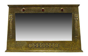 
	
		An Arts and Crafts brass framed over-mantel mirror with ceramic insets 
		c.1905 
		The...