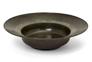 
	
		A large bronze bowl, 18th/19th century, of shallow form, 40cm diameter, 

	

